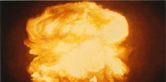 “Here We Stand, Tall & Proud, in The Shadow of the Mushroom Cloud…”