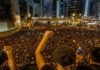 Hong Kong protesters march demanding leader resign