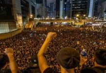 Hong Kong protesters march demanding leader resign