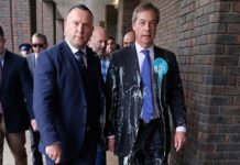 Man who threw milkshake at Nigel Farage ordered to pay suit-cleaning bill