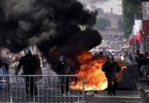 Macron Bastille Day: Booed at celebrations riot erupts