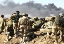 UK suspends arms sales to Turkey